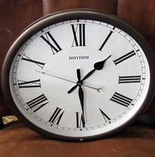"RHYTHM" MELODY WALL CLOCK -    W/ 12 MELODIES CMH765UR06 - "SONORE"