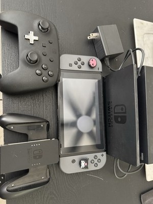 Nintendo Switch With Accessories and (256gb) micro sd card and 1 game included. 