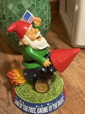 Patriotic Gnome Figurine with American Flag Riding Rocket