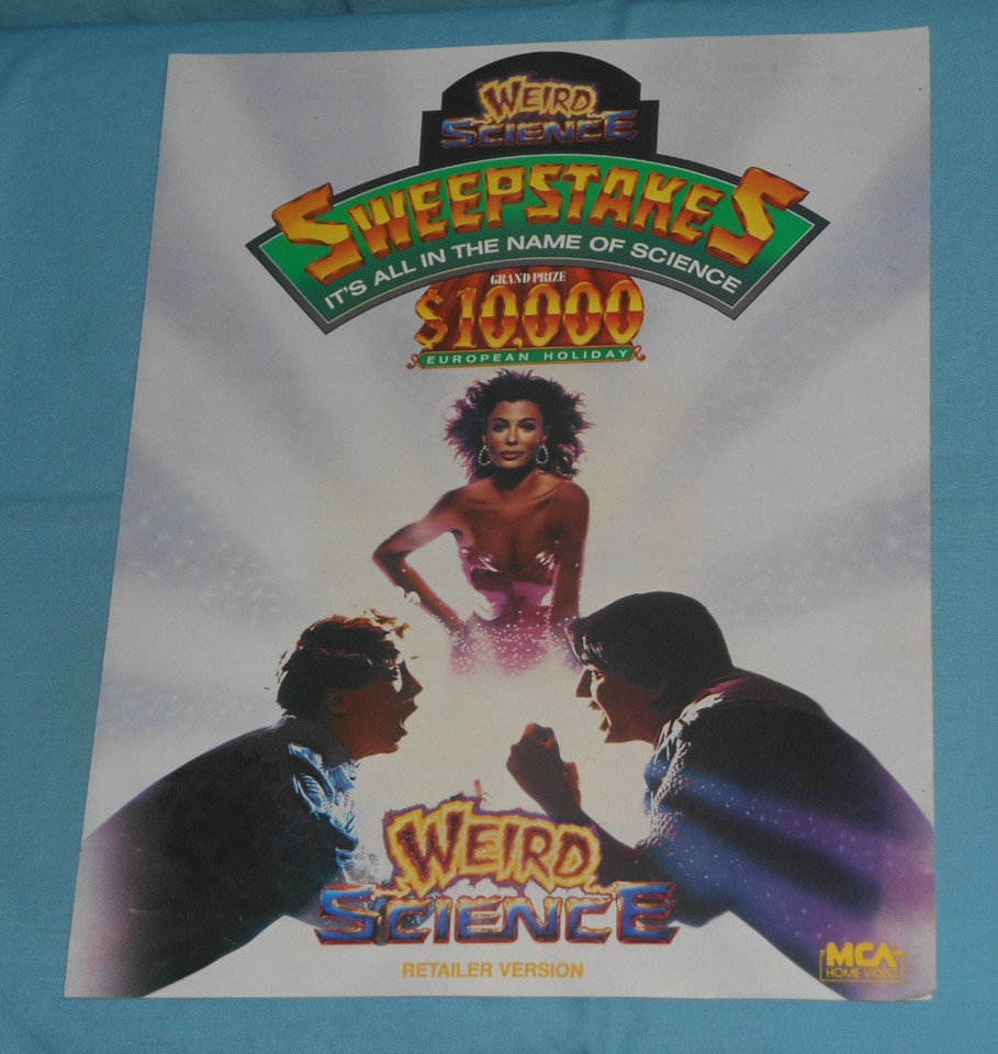 An original video store promotional brochure for Weird Science (1985) — actual physical proof that video rental culture existed.