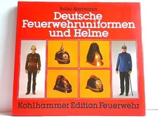 Deutsche Feuerwehruniformen und Helme. Hartma...