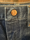Brown leather VTG 1989 kids’ Wrangler jeans, size 7 reg, with orange stitching and front button closure.