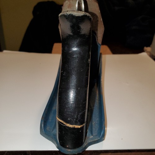 Vintage blackhawk C557MP wood hand plane with smooth bottom, blue metal handle, and visible wood grain markings.