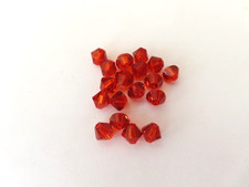 18 Swarovski Bicone Beads 6mm Indian Red. 5328
