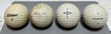 Lot of 4 Assorted Vintage Golf Balls Titleist, Acushnet, Wilson Staff, TM