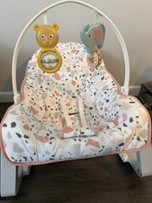 Fisher-Price Multicolor Baby Bouncer with Toy Bar, Washable Cover, Portable
