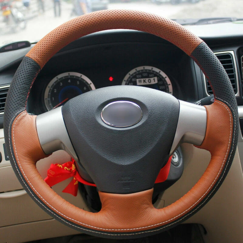 Cubierta envolvente superior de cuero para volante con costura manual para Toyota Corolla Foto 2 de 4