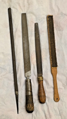 Three Vintage Iron Files and One Vintage File Brush