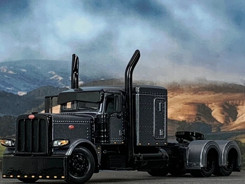 1/64 DCP GUN METAL GRAY PETERBILT 389 W/ 63" FLAT TOP SLEEPER