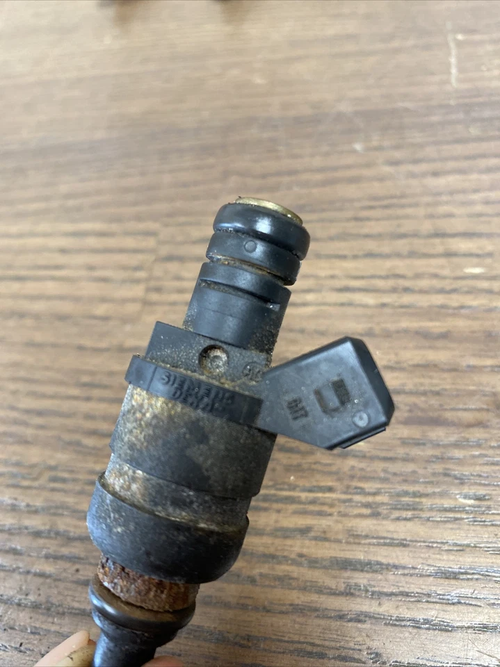 Inyectores de combustible OEM BMW X3 Z3 Z4 528i 323i 328Ci 323Ci 525i 325xi 320i 1427240 Foto 2 de 3