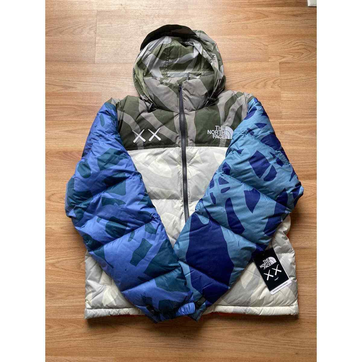 KAWS x TNF 1996 Nuptse The North Face Jacket Moonlight Ivory KAWS x TNF 1996 Nuptse The North Face Jacket Moonlight Ivory