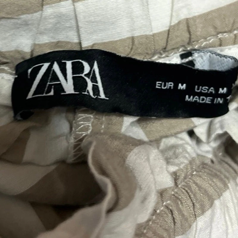 Calça Zara bege listrada branca borla amarrar cintura alta cônica tamanho M - Imagem 4 de 4