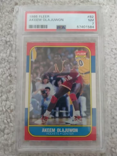 HAKEEM OLAJUWON 1986-87 Fleer Rookie Card #82 Houston Rockets Hakeem * PSA 7 NM!