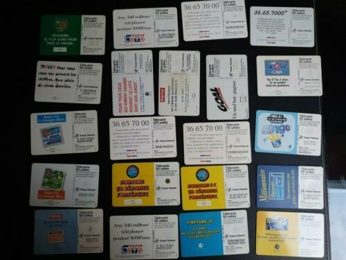 1 carton comprenant 10 classeurs de télécartes neuves et usées