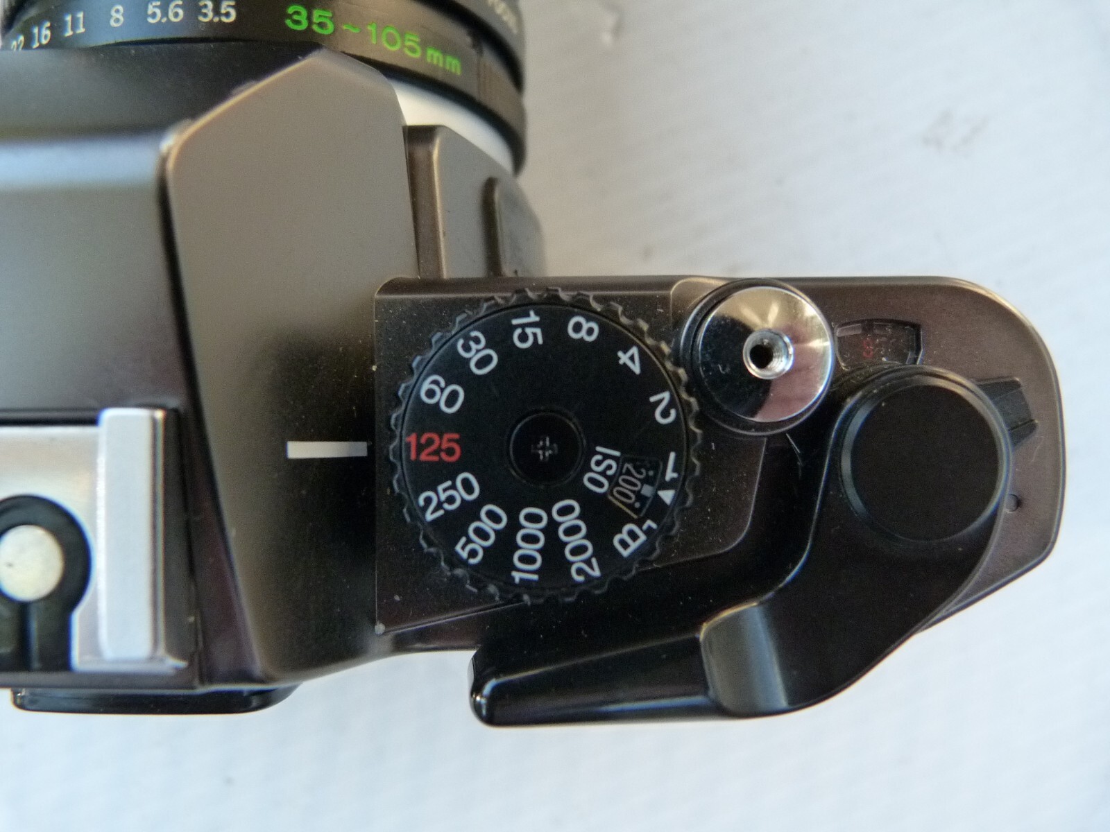 OLYMPUS OM2000 spot metering 35mm SLR Film Camera with 35-105/3.5-4.5 lens. READ