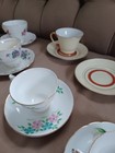 Set of 11 vintage/antique bone china teacups and saucers. — photo 3