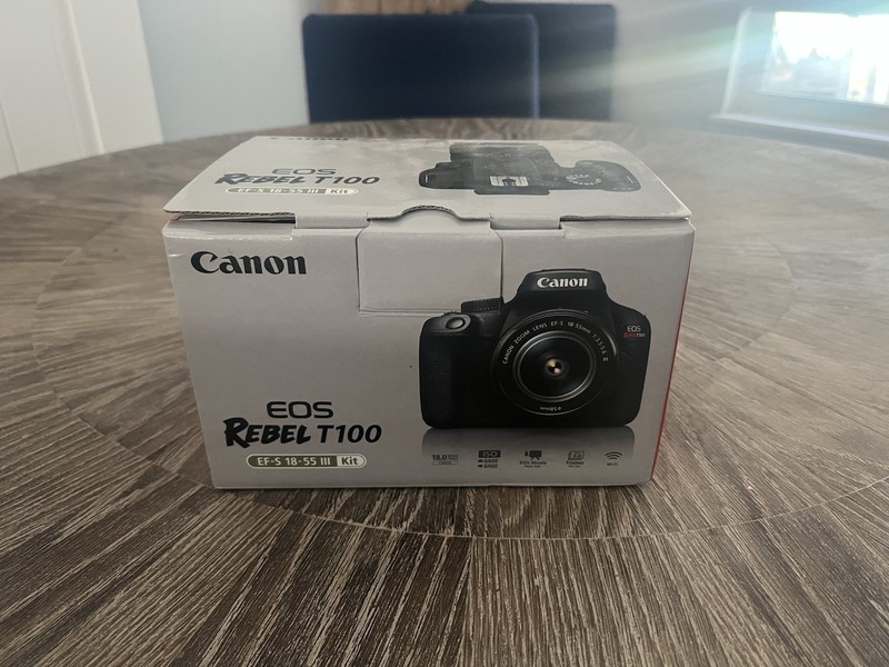 Canon EOS Rebel T100 DSLR Camera with EF-S 18-55mm f/3.5-5.6 Lens