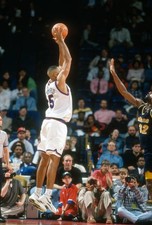 Juwan Howard Washington Bullets shoots over Dale Davis Indiana Pac- Old Photo 1