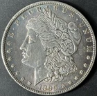 1899-P $1 Morgan Dollar - Raw AU - See Pictures