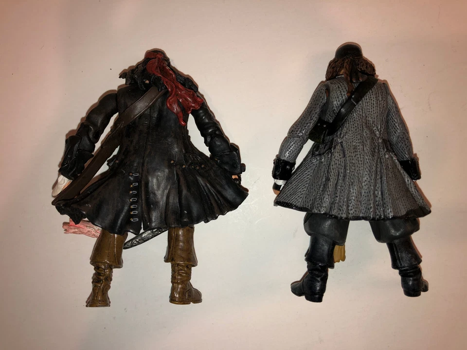 Lote de figuras de acción Capitán Barbossa y Jack Sparrow 4" Piratas del Caribe Foto 2 de 2