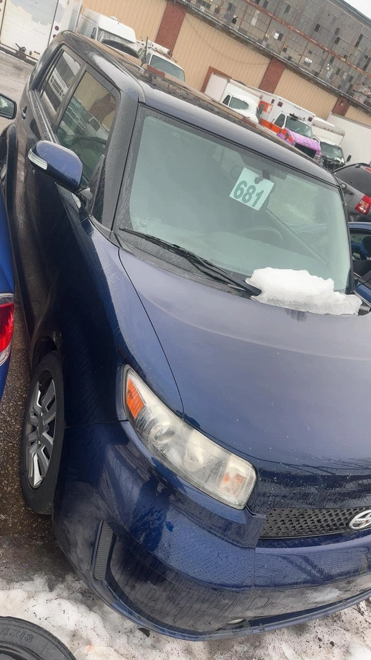 08-15 SCION XB eje delantero izquierdo Foto 3 de 4