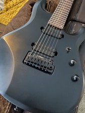 Sterling by Music Man JP70NB-SBK/R 7-String Electric Guitar - Black