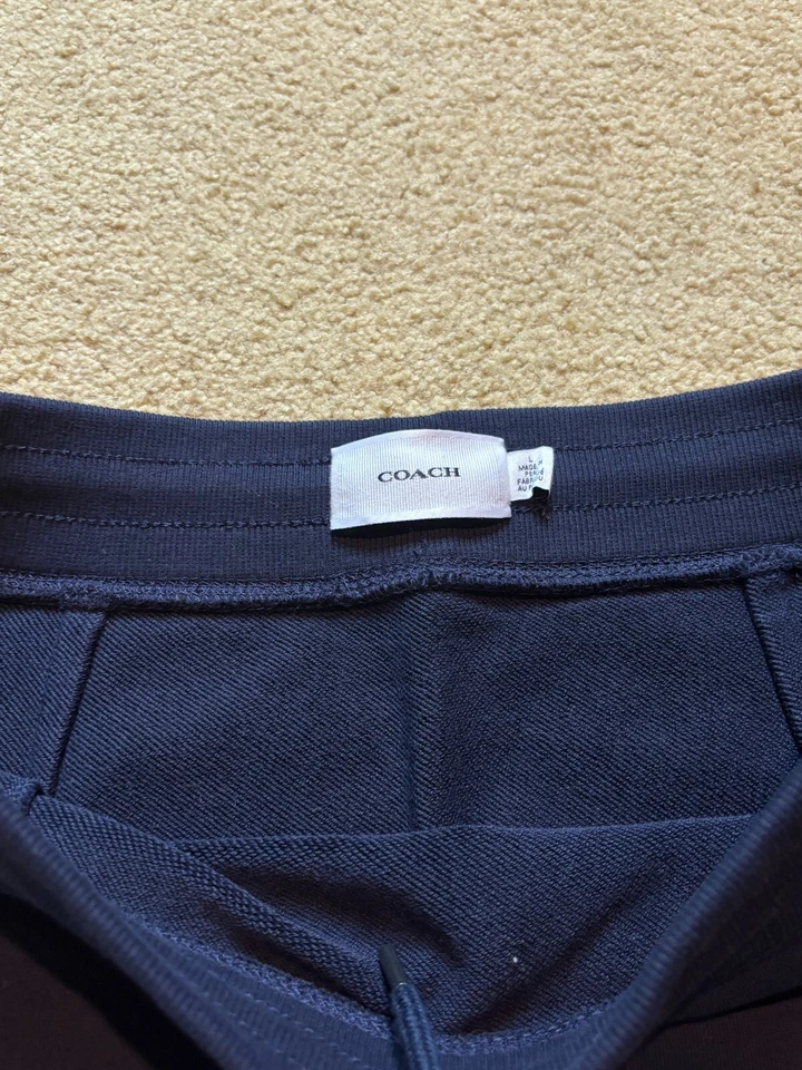 Minifalda de tenis Coach azul marino y blanco náutica línea A con cordón logotipo L Foto 3 de 4