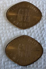 Two Brass GM General Motors 1955 Motorama Spinner Tokens