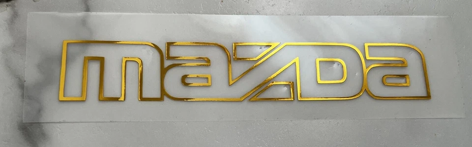 **Oro cromado ** 90-93 Miata parachoques delantero Mazda calcomanía logotipo pegatina JDM 6”X1” Foto 2 de 3