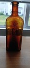 Rawleigh's Cod Liver Oil Embossed Amber Bottle — photo 7
