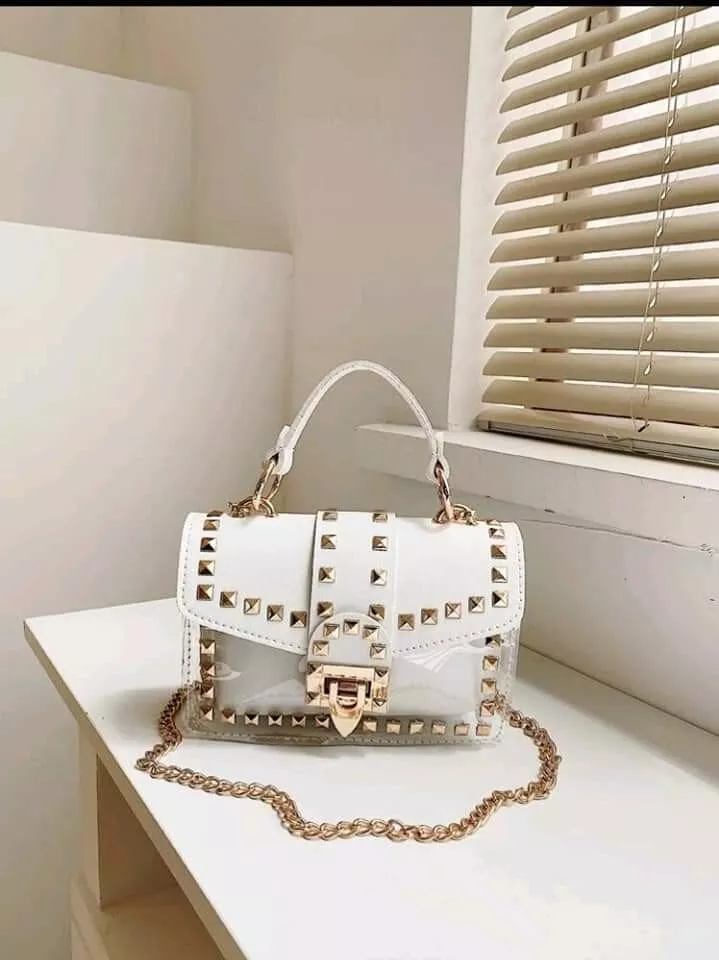 Spike purse hot sale