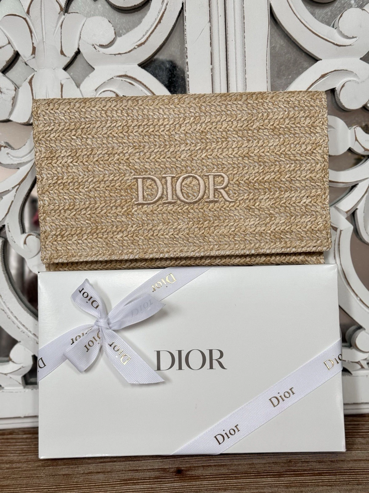 Authentique pochette Dior en raphia