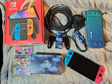 Nintendo Switch OLED Model Console (64GB) Bundle w/ Neon Blue/Red Joy-Con