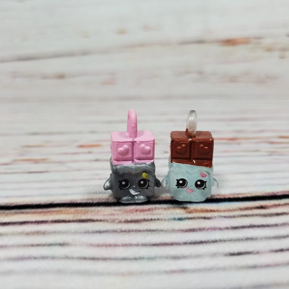 Shopkins Charm Temporada 5 Lote Cheeky Chocolate Translúcido #5-103 Metálico #5-127 Foto 2 de 4