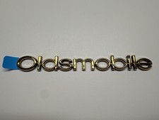 Genuine Gm Oldsmobile Gold Nameplate 10342809