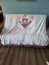 Vintage tulip and butterfly quilt. not perfect. approx 70" x 80"