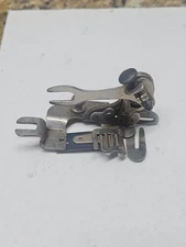 1894 Singer ruffler attachment presser foot for a sewing machine. 