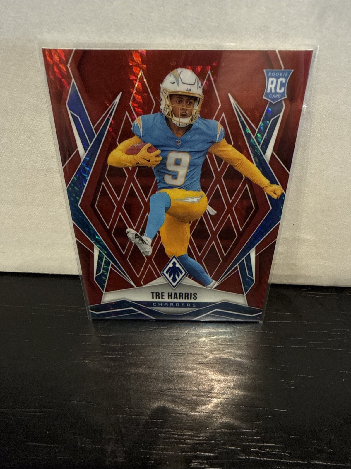 2025 Panini Phoenix - Rookies Tre Harris #160 Red Winter /399 (RC)