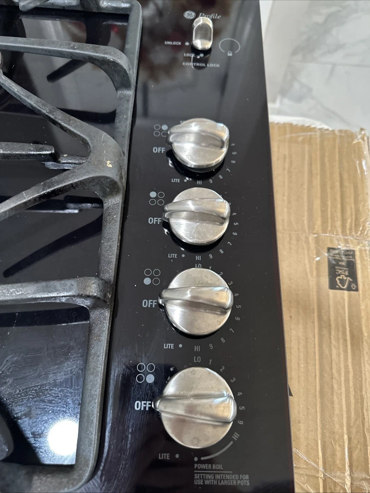 GE Profile 30" Gas Vidrio Quemadores Laterales Controles Inoxidable Jgp940sek2ss Foto 3 de 4