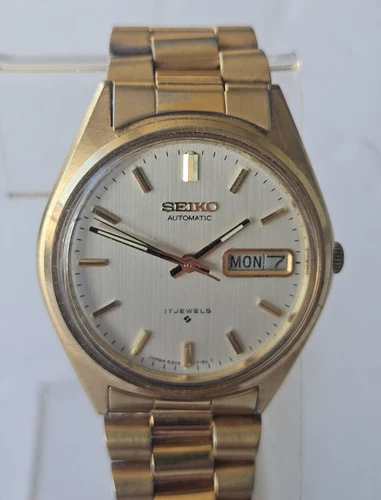 1979 Seiko Automatic #6309-7149 White & Gold Dual 17 Jewels Day Date 35mm Watch