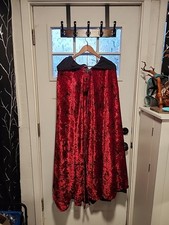 Black And Red Hooded Halloween With Spider Webs A ll Over The Cloak