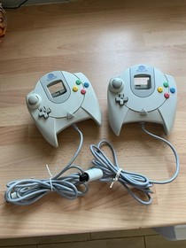 Sega Dreamcast Console And Two Controllers, One Memory Card