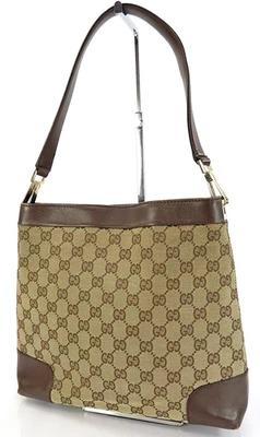 Authentique sac à main bandoulière GUCCI marron GG en toile et cuir #62582A - Photo 1/4