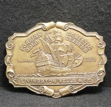 WG09114 VINTAGE 1970s  LIVINGSTON WELLS  CO  FOREIGN GOLD DEALERS BELT BUCKLE