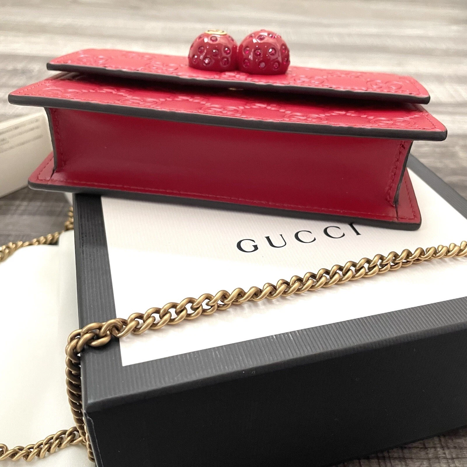 Gucci cherry discount wallet on chain