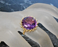 Bague or jaune 18 K sertie amèthyste   poincon  tete d aigle  T56