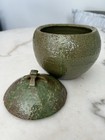 Stoneware pottery lidded jar with green salt glaze — photo 1