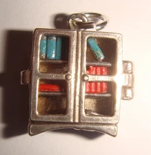 LOVELY VINTAGE SILVER NUVO OPENING BOOKCASE WITH ENAMEL BOOKS CHARM