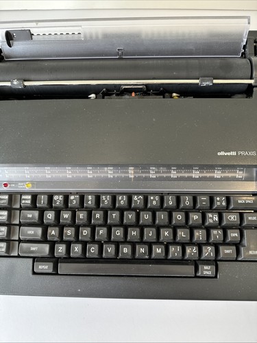 Máquina de escribir eléctrica portátil Olivetti PRAXIS 35 de colección - con estuche - probada funciona - Imagen 4 de 23