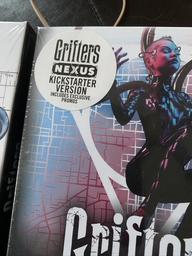 Grifters & Nexus Kickstarter Edition. 2 Games. Both Sealed. - Picture 2 of 4